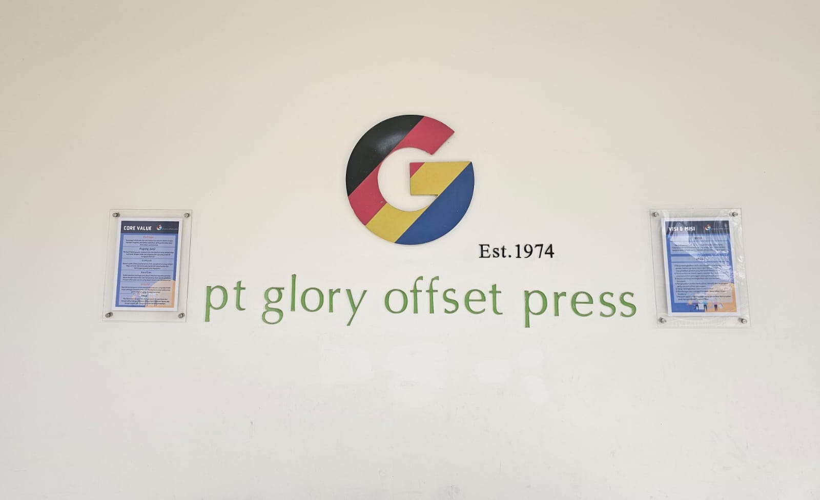 PT Glory Offset Press factory entrance signage with the company G logo and Est. 1974 mark